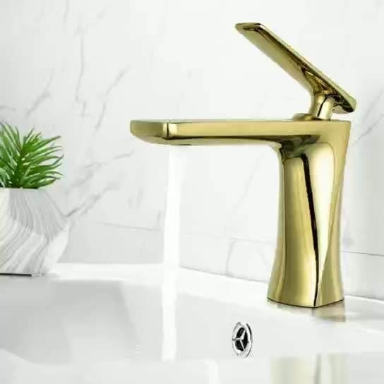 El solo fregadero del lavabo del agua de la manija de las mercancías del mezclador del color de oro sanitario de los grifos golpea ligeramente para el cuarto de baño