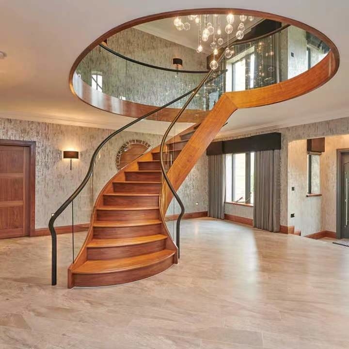 La mano interior de ASTM forjó la escalera curvada moderna de lujo del chalet espiral de las escaleras del metal